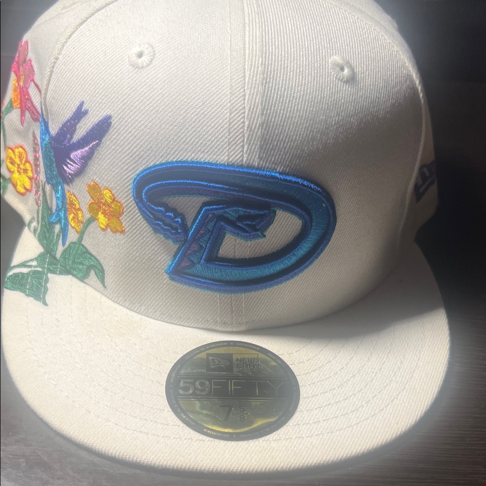 New Era Cream Cap with Blue Logo and Floral Embroidery